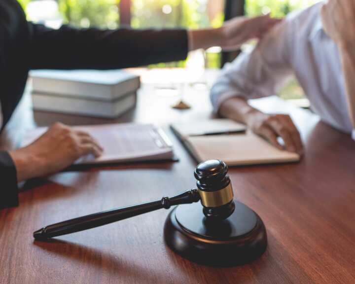 professional lawyer discussing legal options and solutions with a client in Sarasota